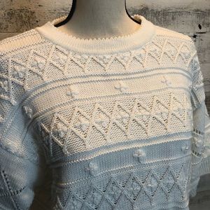 White shortsleeved pull over sweater with cute knit pattern